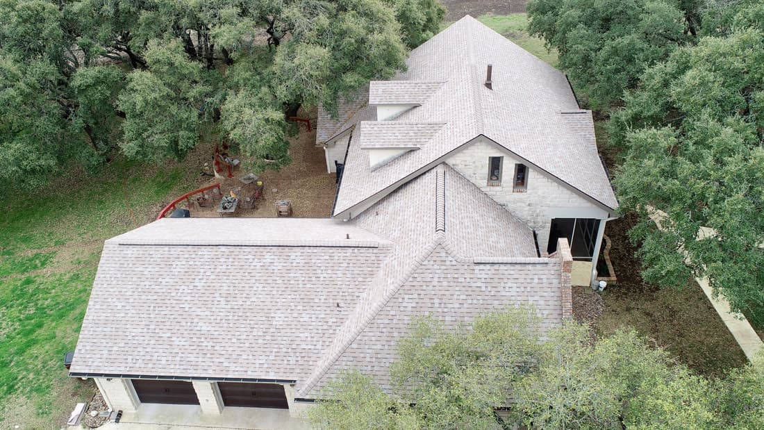 Before and after roof repair by Apache Roofing & Construction